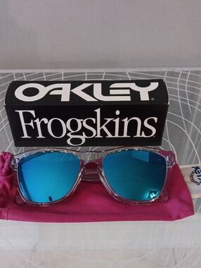 Oakley Clear Frame Sunglasses with Blue Mirrored Lenses and Pink Pouch